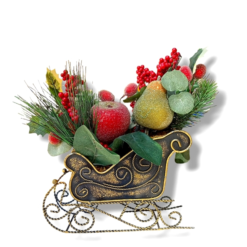 Vintage metal sleigh with floral arrangement